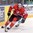 MINSK, BELARUS - MAY 22: Canada's Braydon Coburn #27 stickhandles the puck away from Finland's Pekka Jormakka #25 during quarterfinal round action at the 2014 IIHF Ice Hockey World Championship. (Photo by Richard Wolowicz/HHOF-IIHF Images)